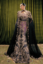 Front profile of luxury bridal mermaid lehenga featuring heavy floral beadwork, a crystal waist belt, and sheer cape wings by Vazaneh