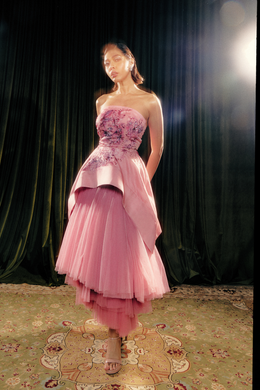 Hand painted sculpted peplum print and layered tulle skirt.