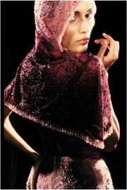 Crystal illusion gown with draped hood and gradient embellishments