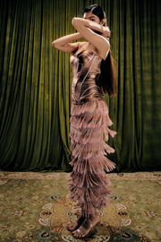Metallic Corset Paired With Crystal Fringe Midi Skirt.