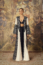 ivory long cape with bustier and skirt