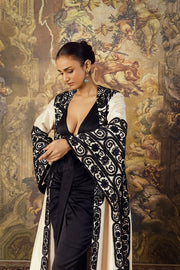 ivory long cape with bustier and skirt