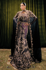 Handcrafted black and purple mermaid lehenga gown styled with an intricately embroidered high-neck capelet by Vazaneh